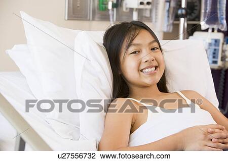 Young Girl Smiling In Hospital Bed View Large Photo Image Stock Image - Young Girl Smiling In Hospital Bed. Fotosearch