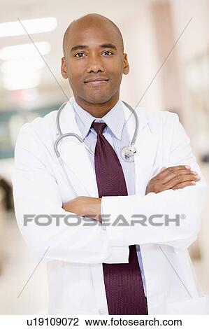 Doctor Standing In A Hospital Corridor View Large Photo Image Stock Image - Doctor Standing In A Hospital Corridor. Fotosearch