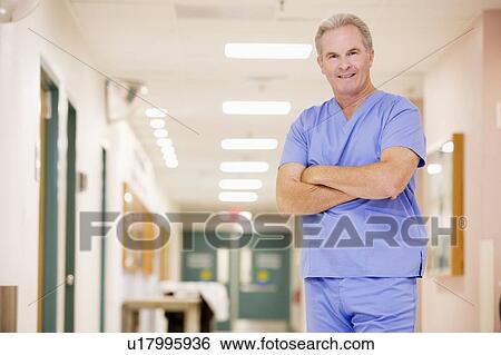 Doctor Standing In A Hospital Corridor View Large Photo Image Stock Photograph - Doctor Standing In A Hospital Corridor. Fotosearch