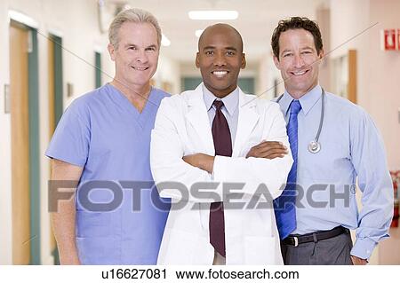 Doctors Standing In A Hospital Corridor View Large Photo Image Stock Image - Doctors Standing In A Hospital Corridor. Fotosearch