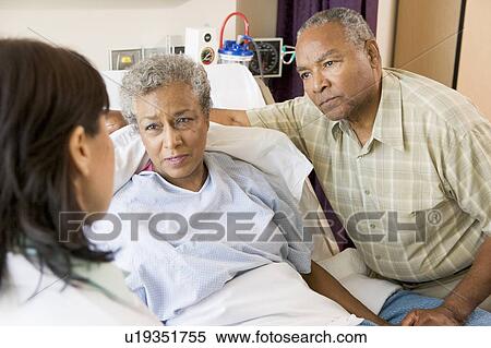 Doctor Talking To Senior Couple View Large Photo Image Stock Photography - Doctor Talking To Senior Couple. Fotosearch