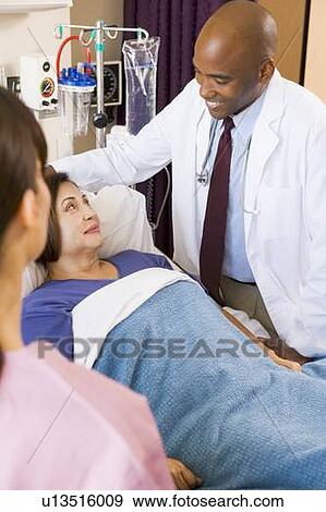 Doctor Talking To Senior Woman View Large Photo Image Stock Photo - Doctor Talking To Senior Woman. Fotosearch