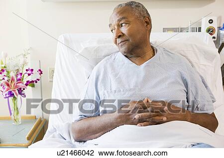 Senior Man Sitting In Hospital Bed View Large Photo Image Stock Image - Senior Man Sitting In Hospital Bed. Fotosearch