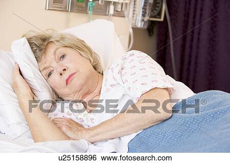 Senior Woman Lying In Hospital Bed View Large Photo Image Stock Photograph - Senior Woman Lying In Hospital Bed. Fotosearch