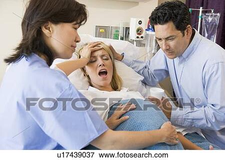 Stock Photo - Woman Giving Birth. Fotosearch