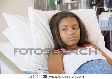 Young Girl Lying In Hospital Bed View Large Photo Image Stock Photo - Young Girl Lying In Hospital Bed. Fotosearch