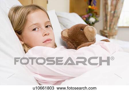 Young Girl Lying In Hospital Bed With Teddy Bear View Large Photo Image Stock Image - Young Girl Lying In Hospital Bed With Teddy Bear. Fotosearch