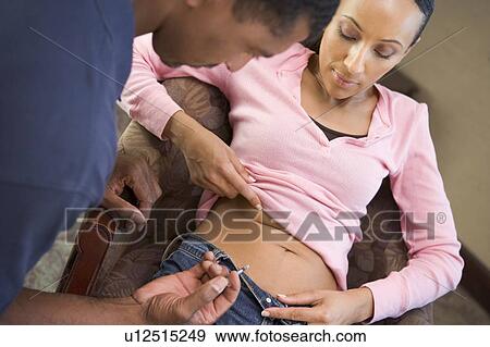 Man helping woman inject drugs to gain pregnancy (selective focus) View Large Photo Image Stock Photo - Man helping woman inject drugs to gain pregnancy (selective focus). Fotosearch