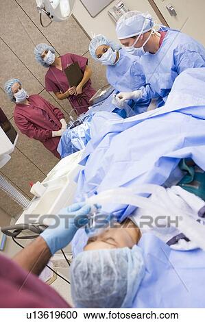 Stock Image - Patient undergoing egg retrieval procedure. Fotosearch