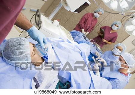 Stock Photo - Patient undergoing egg retrieval procedure. Fotosearch