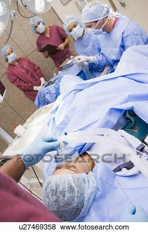 Stock Photo - Patient undergoing egg retrieval procedure. Fotosearch