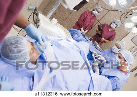 Patient undergoing egg retrieval procedure View Large Photo Image Stock Photograph - Patient undergoing egg retrieval procedure. Fotosearch