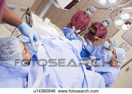 Stock Photograph - Patient undergoing egg retrieval procedure. Fotosearch