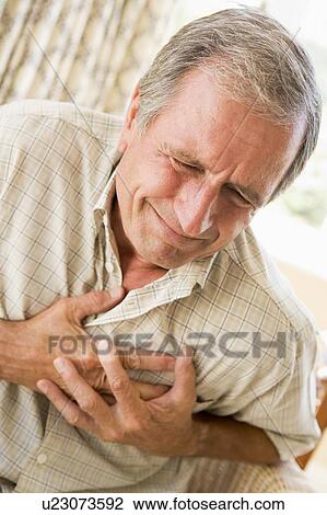 Man Clutching His Heart View Large Photo Image Stock Image - Man Clutching His Heart. Fotosearch