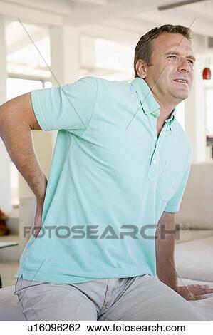 Man With Back Pain View Large Photo Image Stock Image - Man With Back Pain. Fotosearch
