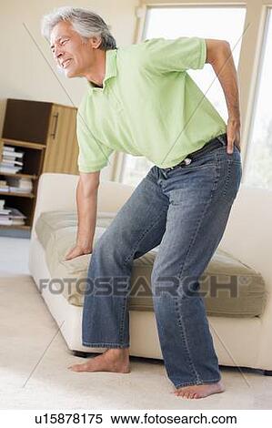 Man With Back Pain View Large Photo Image Stock Photography - Man With Back Pain. Fotosearch