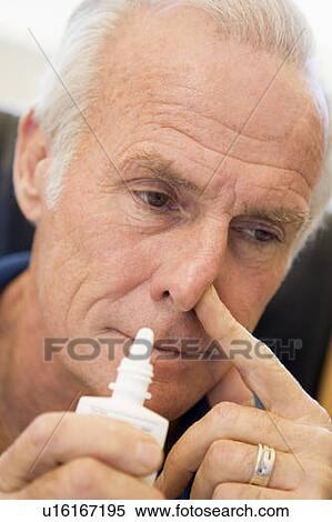 Senior Man Using Nasal Spray View Large Photo Image Stock Photography - Senior Man Using Nasal Spray. Fotosearch