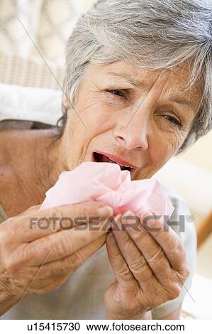 Woman Blowing Her Nose View Large Photo Image Stock Image - Woman Blowing Her Nose. Fotosearch