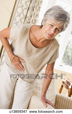 Stock Photo - Woman Feeling Unwell. Fotosearch
