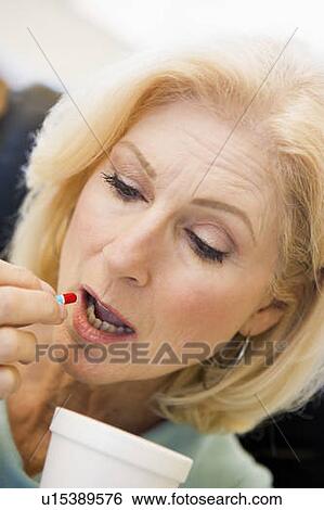Woman Swallowing Pill View Large Photo Image Stock Photograph - Woman Swallowing Pill. Fotosearch
