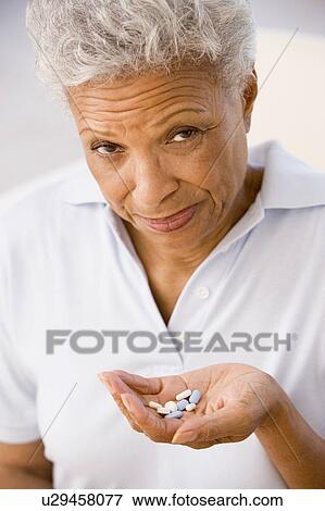 Woman Taking Pills View Large Photo Image Stock Photo - Woman Taking Pills. Fotosearch