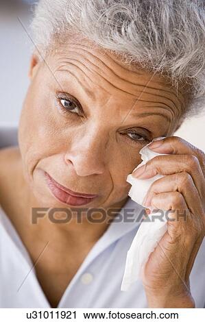 Woman Wiping Away Tears View Large Photo Image Stock Image - Woman Wiping Away Tears. Fotosearch