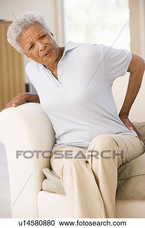 Woman With Back Pain View Large Photo Image Stock Image - Woman With Back Pain. Fotosearch