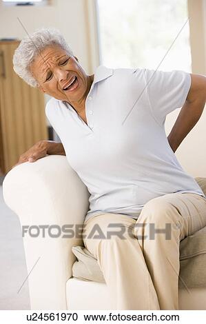 Woman With Back Pain View Large Photo Image Stock Image - Woman With Back Pain. Fotosearch
