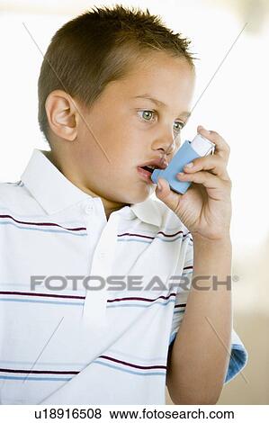 Boy Using An Inhaler View Large Photo Image Stock Photo - Boy Using An Inhaler. Fotosearch