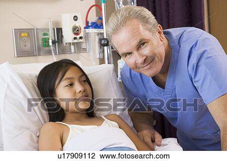 Doctor Checking Up On His Patient View Large Photo Image Stock Image - Doctor Checking Up On His Patient. Fotosearch
