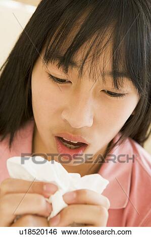 Stock Photograph - Girl Sneezing. Fotosearch