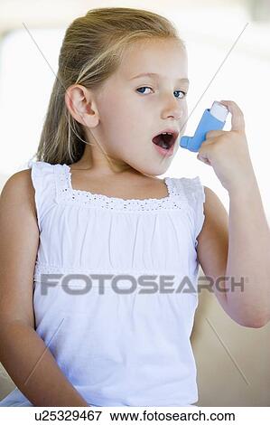 Girl Using An Inhaler View Large Photo Image Stock Photo - Girl Using An Inhaler. Fotosearch