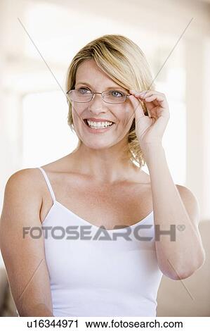 Woman Looking Through New Glasses View Large Photo Image Stock Image - Woman Looking Through New Glasses. Fotosearch
