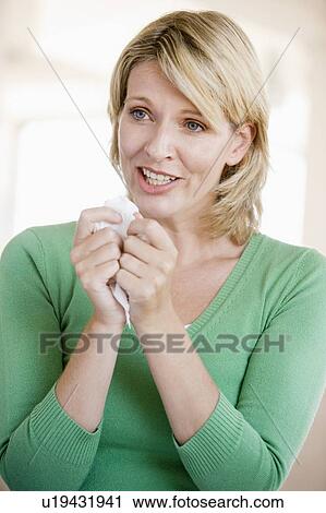 Stock Image - Woman Sneezing. Fotosearch