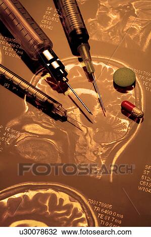 Stock Image - "Close-up of injection, tablet and capsule". Fotosearch