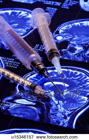 Stock Photo - Close-up of three injections. Fotosearch
