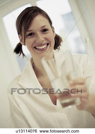 Drinking water is healthy View Large Photo Image Stock Photograph - Drinking water is healthy. Fotosearch