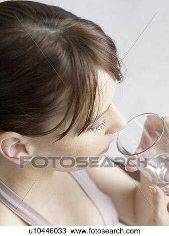 Drinking woman View Large Photo Image Stock Image - Drinking woman. Fotosearch