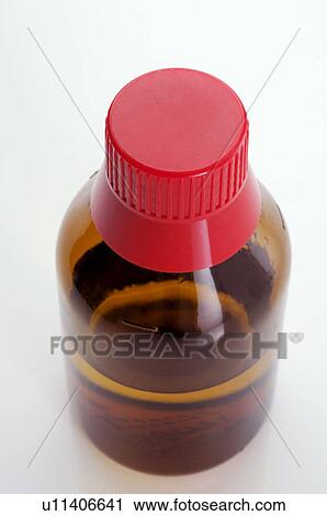 Stock Image - Medicine bottle with alcohol. Fotosearch