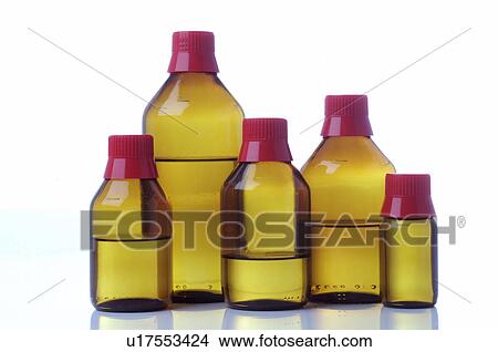 Medicine bottles with alcohol View Large Photo Image Picture - Medicine bottles with alcohol. Fotosearch