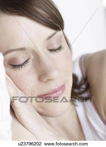 Stock Image - Sleeping woman. Fotosearch