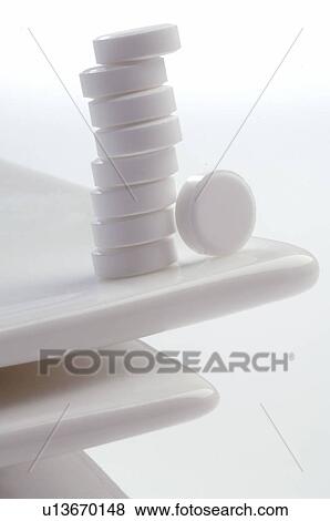Stock Photo - White pills. Fotosearch