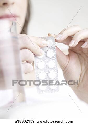 Woman with pills View Large Photo Image Stock Photo - Woman with pills. Fotosearch