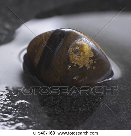 Stock Photo - Healing stone tiger's eye. Fotosearch