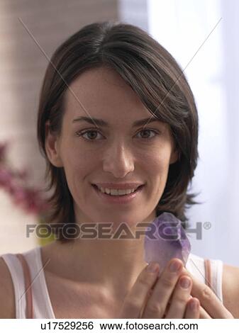 Woman with amethyste in her hands View Large Photo Image Stock Photograph - Woman with amethyste in her hands. Fotosearch