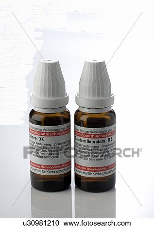 Small bottles with globules View Large Photo Image Stock Image - Small bottles with globules. Fotosearch
