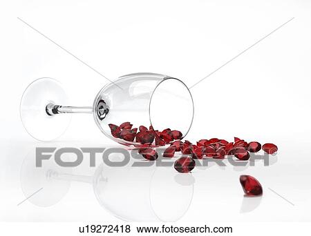 Rubies spilling from a wine glass View Large Illustration Stock Illustration - Rubies spilling from a wine glass. Fotosearch