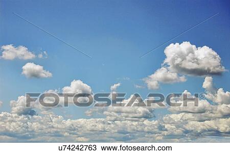 Drawing - Blue sky with clouds, artwork. Fotosearch