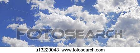 Drawing - Blue sky with cumulus clouds, artwork. Fotosearch