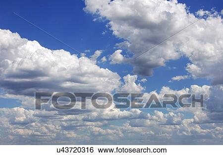 Stock Illustration - Blue sky with cumulus clouds, artwork. Fotosearch